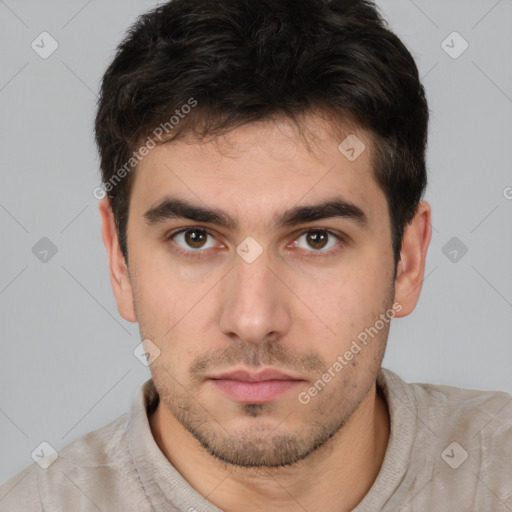 Neutral white young-adult male with short  brown hair and brown eyes