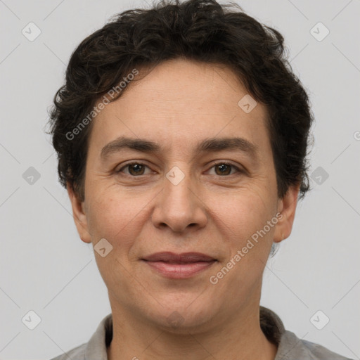 Joyful white adult female with short  brown hair and brown eyes