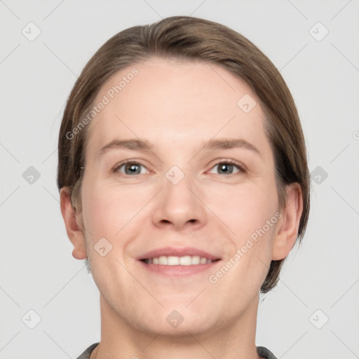 Joyful white young-adult female with short  brown hair and grey eyes