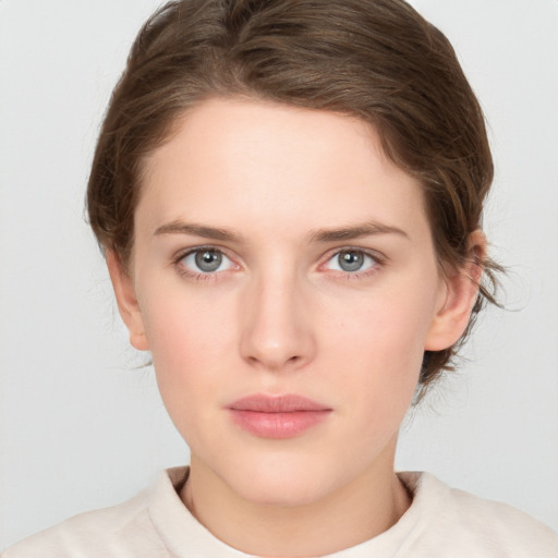 Neutral white young-adult female with medium  brown hair and grey eyes