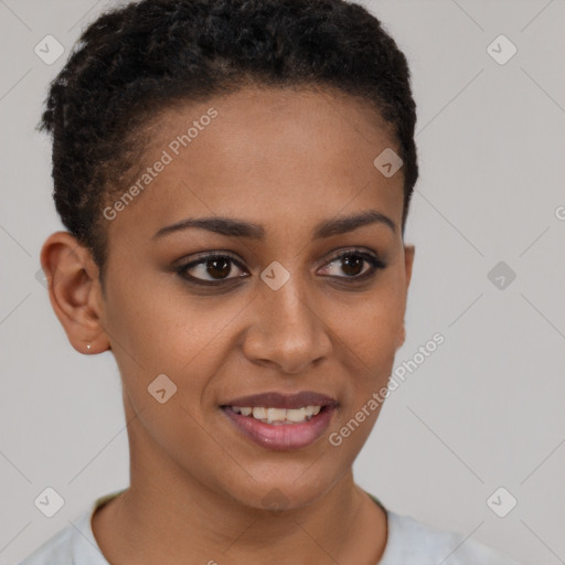 Joyful black young-adult female with short  brown hair and brown eyes