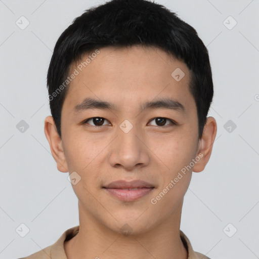 Joyful asian young-adult male with short  brown hair and brown eyes