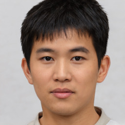 Neutral asian young-adult male with short  black hair and brown eyes