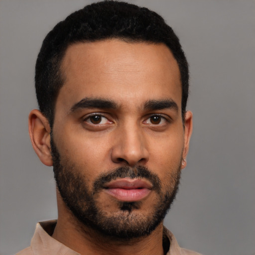 Neutral black young-adult male with short  black hair and brown eyes