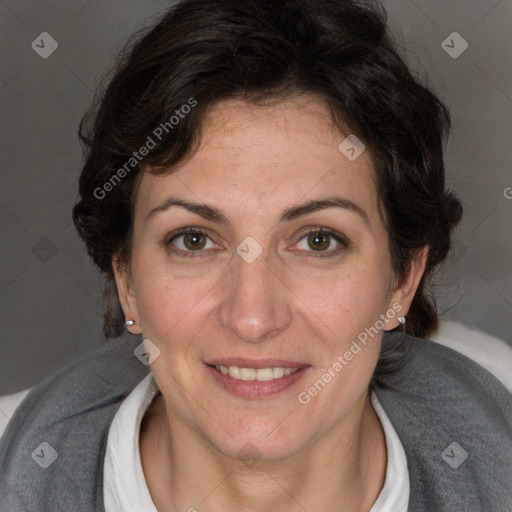 Joyful white adult female with short  brown hair and brown eyes