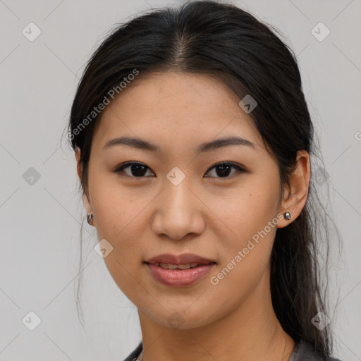 Joyful asian young-adult female with long  brown hair and brown eyes