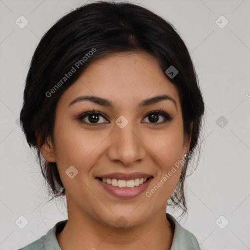 Joyful latino young-adult female with medium  brown hair and brown eyes