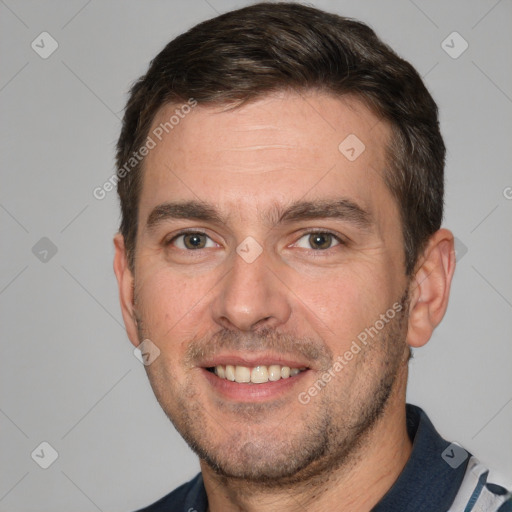 Joyful white young-adult male with short  brown hair and brown eyes