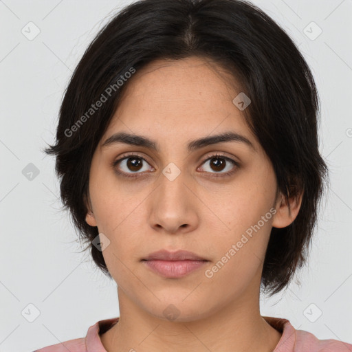 Neutral white young-adult female with medium  brown hair and brown eyes