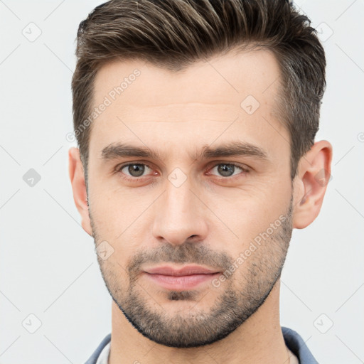 Neutral white young-adult male with short  brown hair and brown eyes