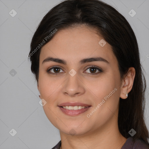 Joyful white young-adult female with medium  brown hair and brown eyes