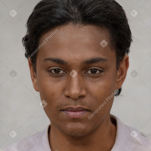 Neutral black young-adult female with short  black hair and brown eyes