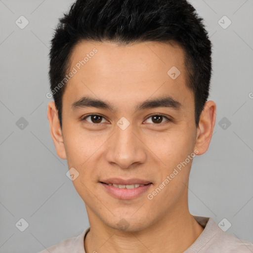 Joyful white young-adult male with short  black hair and brown eyes