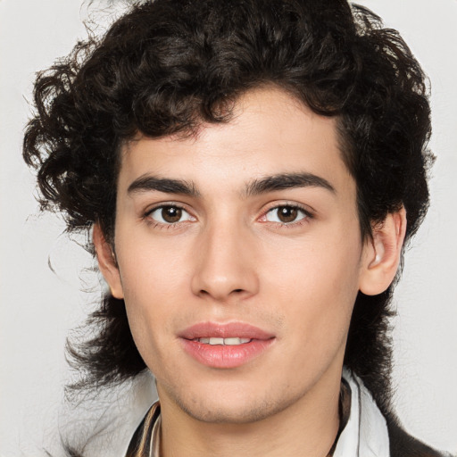 Joyful white young-adult male with medium  brown hair and brown eyes