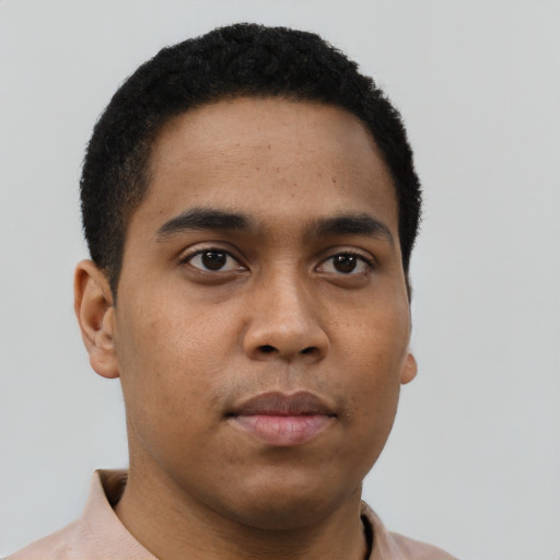 Neutral latino young-adult male with short  brown hair and brown eyes