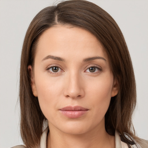 Neutral white young-adult female with medium  brown hair and brown eyes