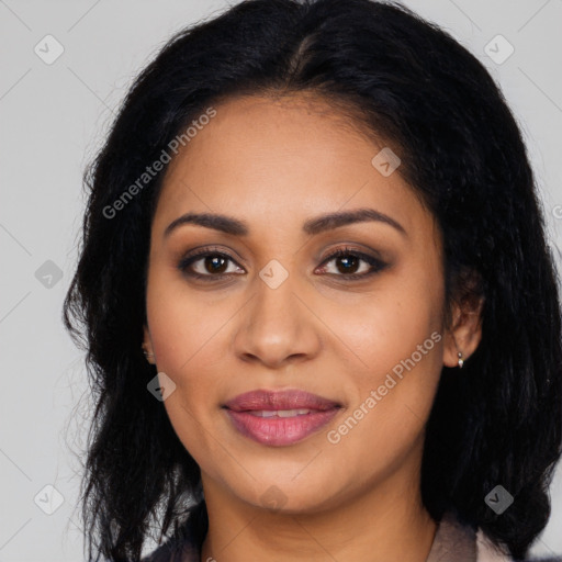 Joyful latino young-adult female with long  black hair and brown eyes