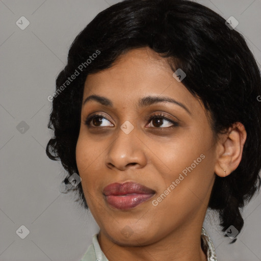 Joyful asian young-adult female with medium  black hair and brown eyes