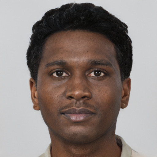 Neutral black young-adult male with short  black hair and brown eyes
