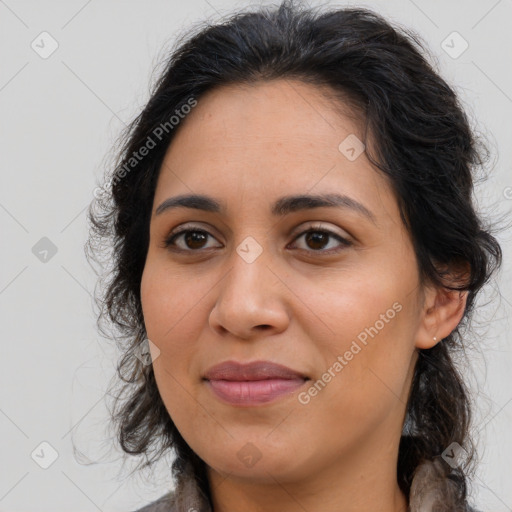 Joyful latino young-adult female with long  brown hair and brown eyes