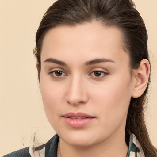 Neutral white young-adult female with medium  brown hair and brown eyes