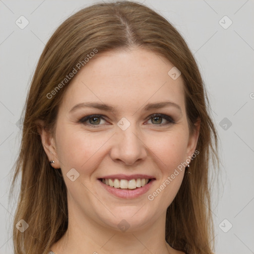 Joyful white young-adult female with long  brown hair and green eyes