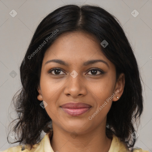 Joyful black young-adult female with medium  brown hair and brown eyes