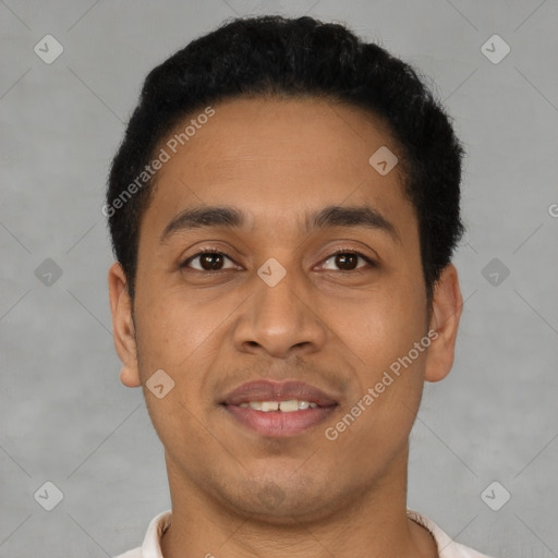 Joyful latino young-adult male with short  brown hair and brown eyes