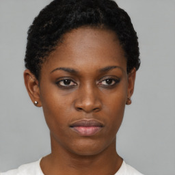 Neutral black young-adult female with short  black hair and brown eyes