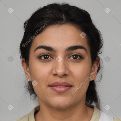 Joyful latino young-adult female with medium  brown hair and brown eyes