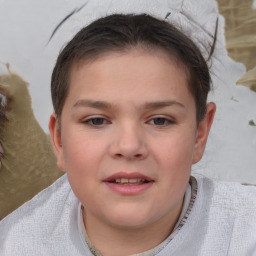 Joyful white child female with short  brown hair and brown eyes