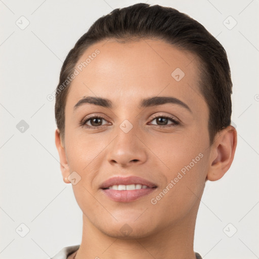 Joyful white young-adult female with short  brown hair and brown eyes