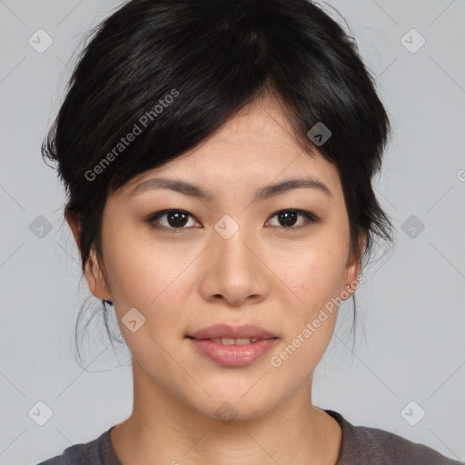 Joyful asian young-adult female with medium  black hair and brown eyes