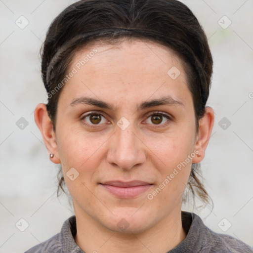 Joyful white adult female with short  brown hair and brown eyes