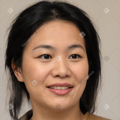 Joyful asian young-adult female with medium  brown hair and brown eyes