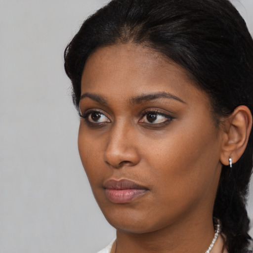 Neutral asian young-adult female with short  black hair and brown eyes