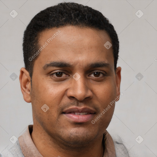 Joyful latino young-adult male with short  brown hair and brown eyes