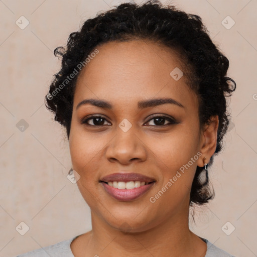 Joyful latino young-adult female with short  black hair and brown eyes