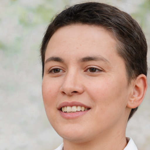 Joyful white young-adult female with short  brown hair and brown eyes