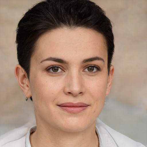 Joyful white young-adult female with short  brown hair and brown eyes