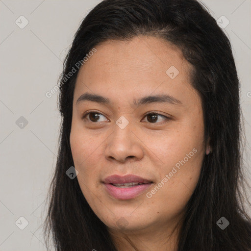 Joyful white adult female with long  brown hair and brown eyes