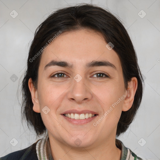 Joyful white young-adult male with medium  brown hair and brown eyes