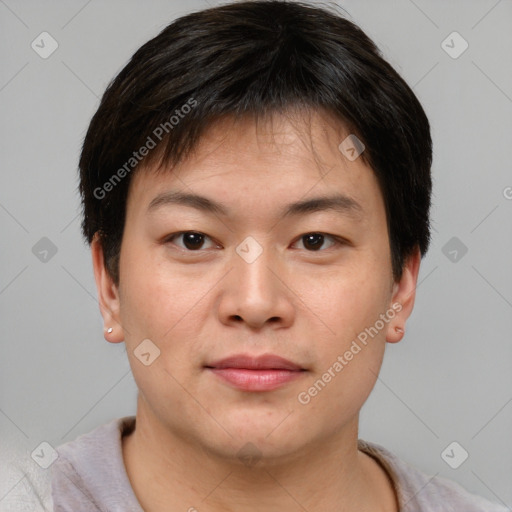 Joyful asian young-adult male with short  brown hair and brown eyes