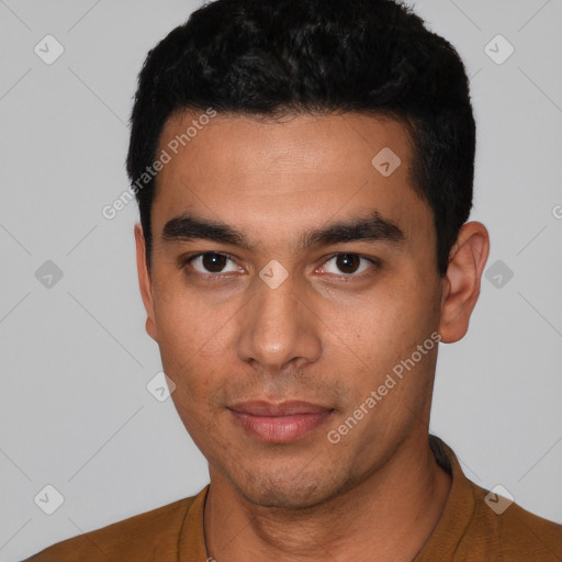 Neutral latino young-adult male with short  black hair and brown eyes
