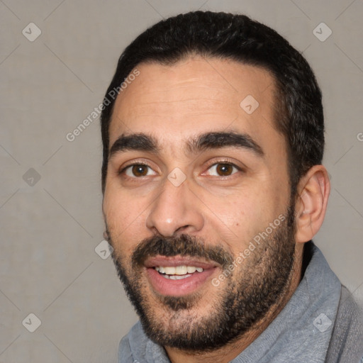 Joyful white young-adult male with short  black hair and brown eyes