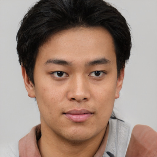 Neutral asian young-adult male with short  brown hair and brown eyes