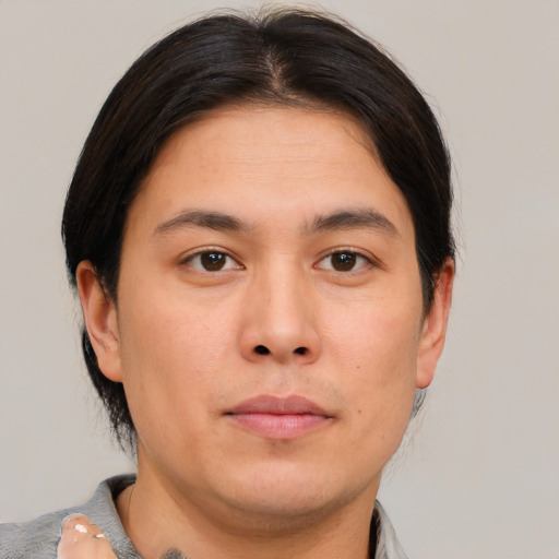 Neutral asian young-adult male with short  brown hair and brown eyes