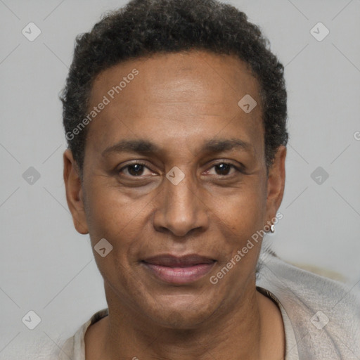 Joyful black adult male with short  brown hair and brown eyes