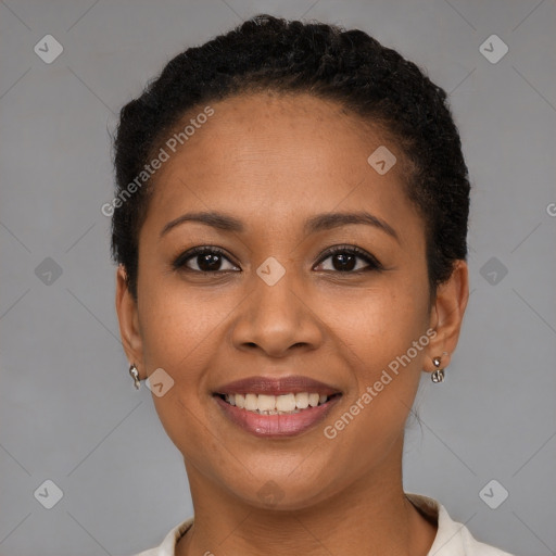 Joyful latino young-adult female with short  brown hair and brown eyes