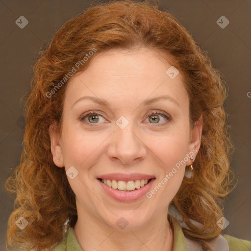 Joyful white young-adult female with medium  brown hair and green eyes